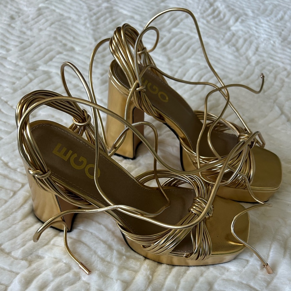 Gold platform heels